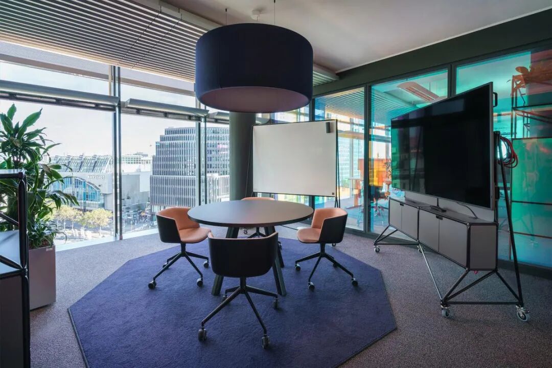 Sit-stand height-adjustable desk configuration for hybrid workspaces